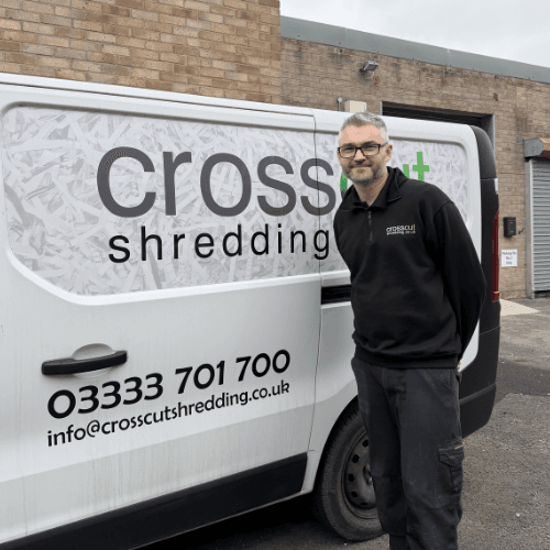 Dan Simmons standing in front of a Cross Cut Shredding van
